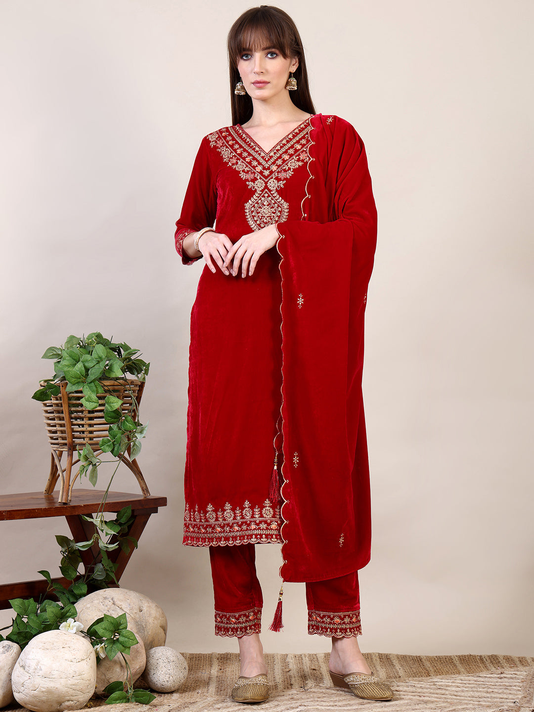 Close up of pink velvet embroidered kurta set with 3/4th sleeves and matching dupatta