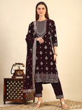Wine color velvet kurta set with gold foil print detailing, including matching pants and dupatta.