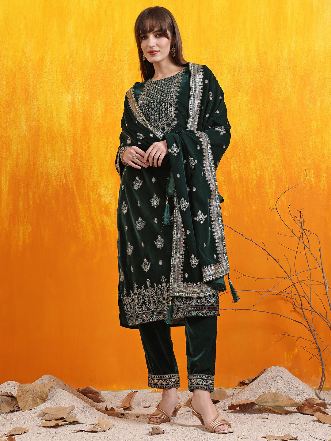 Bottle-green velvet kurta set with hand-embroidery and foil print detailing