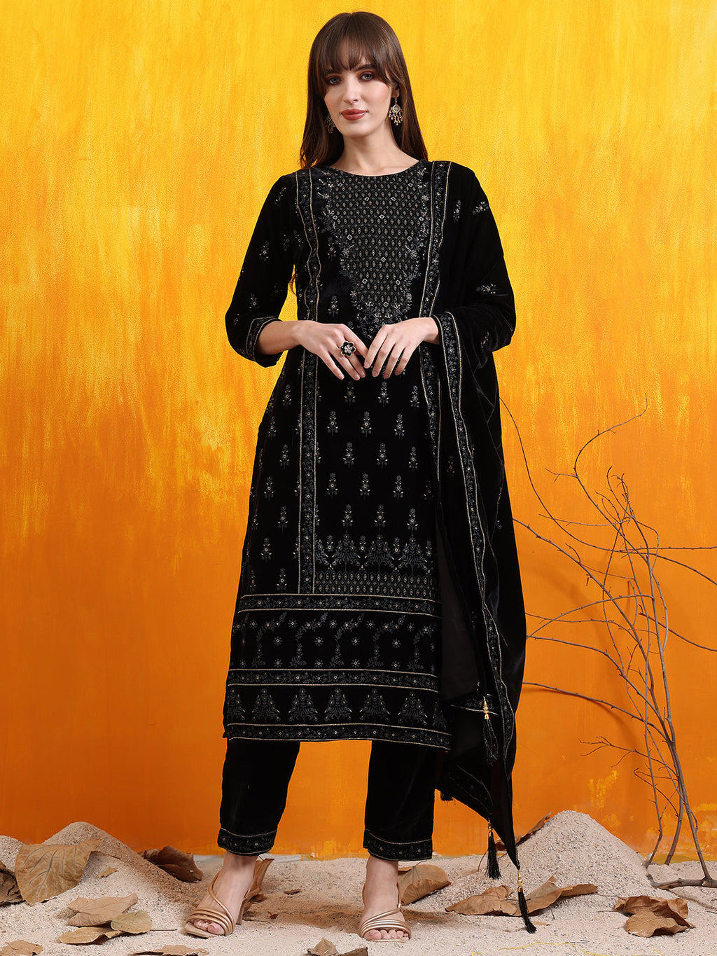 Elegant black velvet kurta with hand embroidery and foil print details