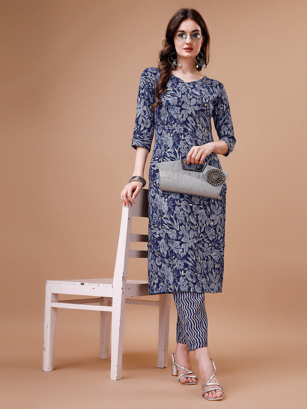 Multicolor floral printed rayon kurta with matching pants, featuring a collar neck and 3/4th sleeves.