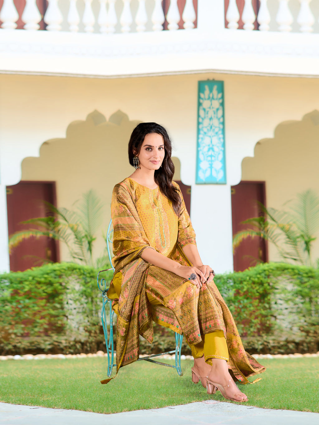 Yellow pure silk kurta with hand embroidery paired with matching pants and printed dupatta