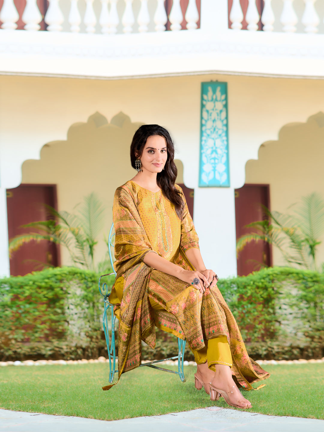 Yellow pure silk kurta with hand embroidery paired with matching pants and printed dupatta