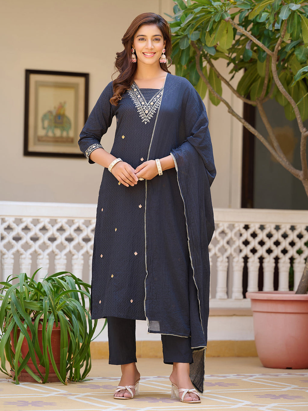 Navy blue cotton kurta set with zari and sequin embroidery featuring 3/4th sleeves and sweetheart neck
