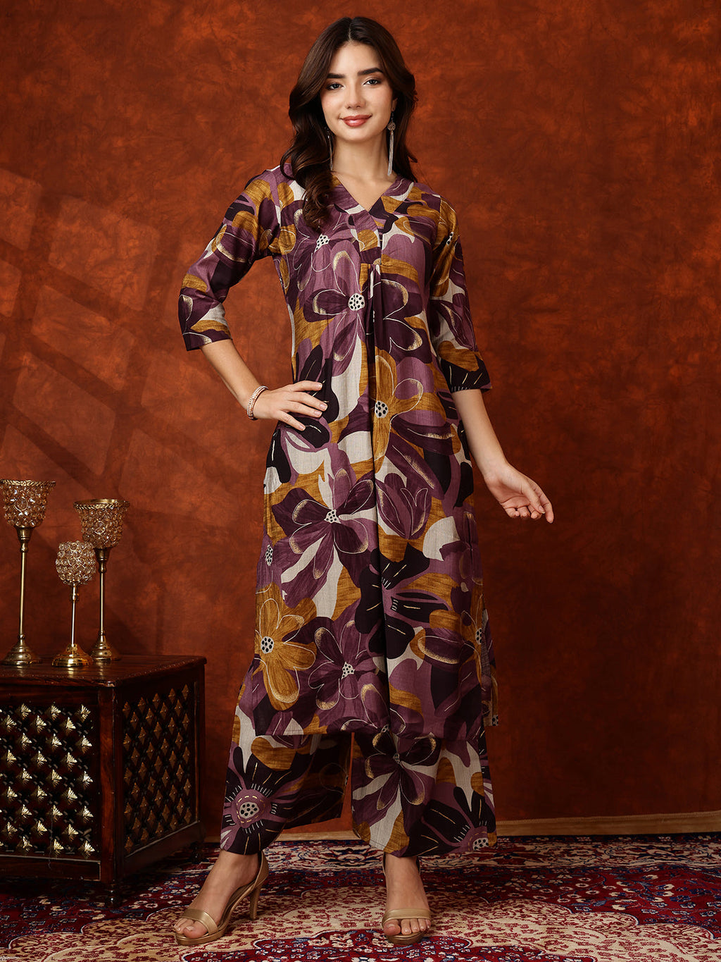 Purple floral printed rayon kurta paired with matching palazzo pants for women