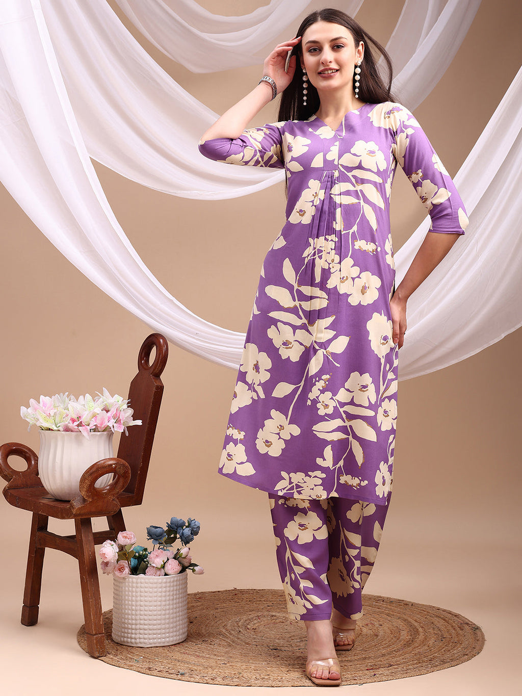 Lavender floral printed rayon kurta paired with a matching palazzo pant set.