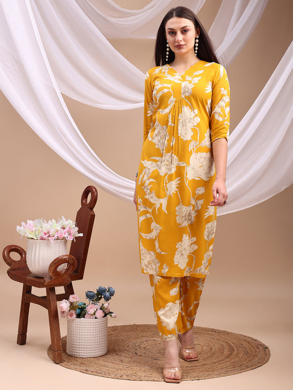 Yellow floral printed rayon kurta set with comfortable palazzo pants