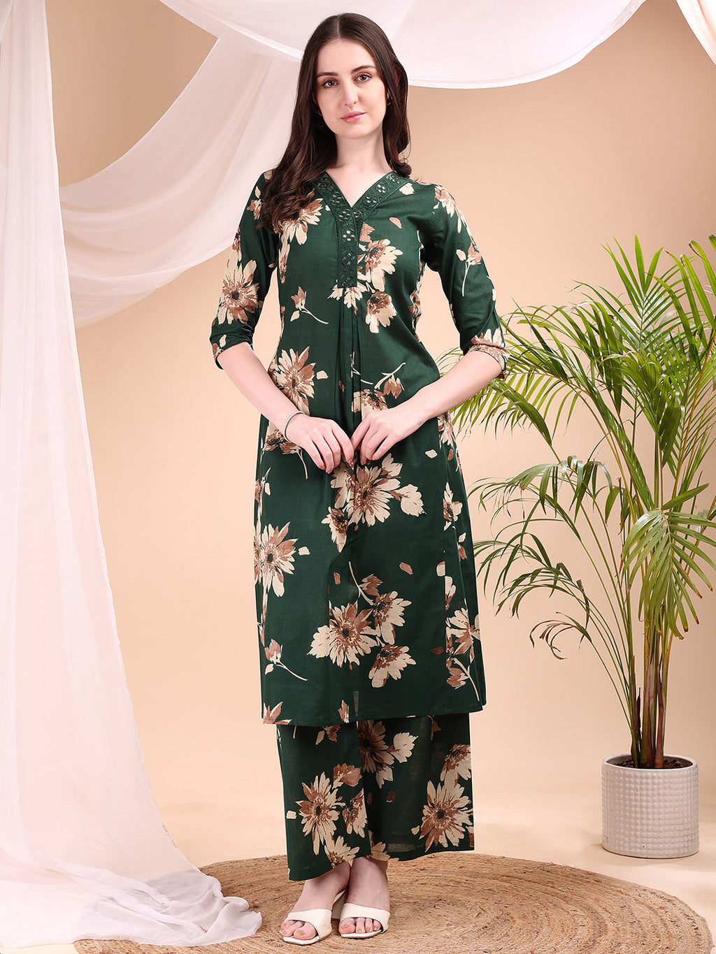 Green embroidered and printed kurta paired with matching palazzo pants