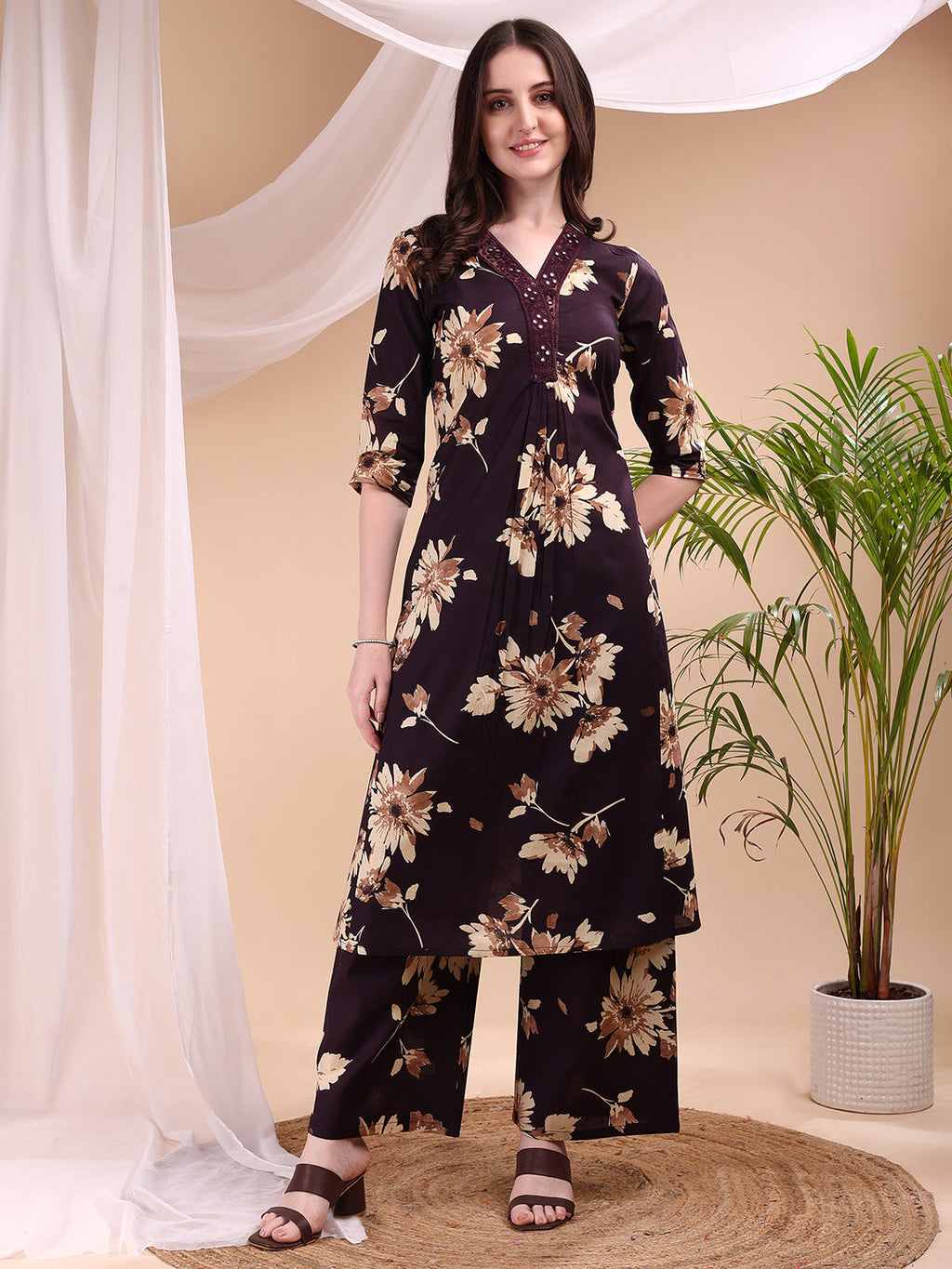 An elegant wine-colored embroidered and printed cotton kurta set with a palazzo.