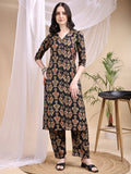 Elegant black kurta featuring traditional Ikat print paired with matching palazzo pants