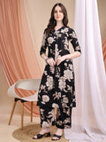 Woman wearing a black floral printed kurta with matching palazzo pants and V-neckline