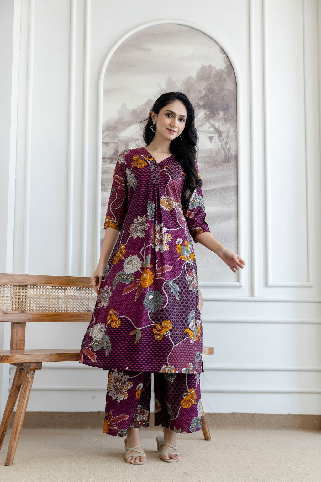 Purple kurta with floral motifs and matching palazzo pants