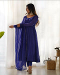 Model wearing a royal blue georgette kurta set with intricate sequence embroidery work