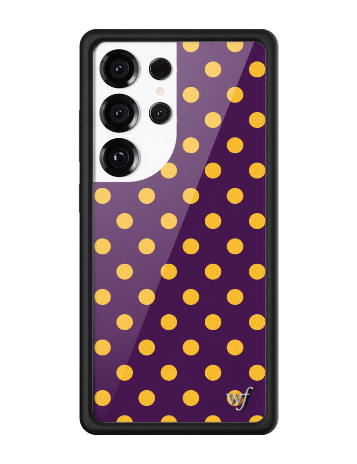 Purple Samsung Galaxy case with vibrant yellow polka dots and a black protective bumper.