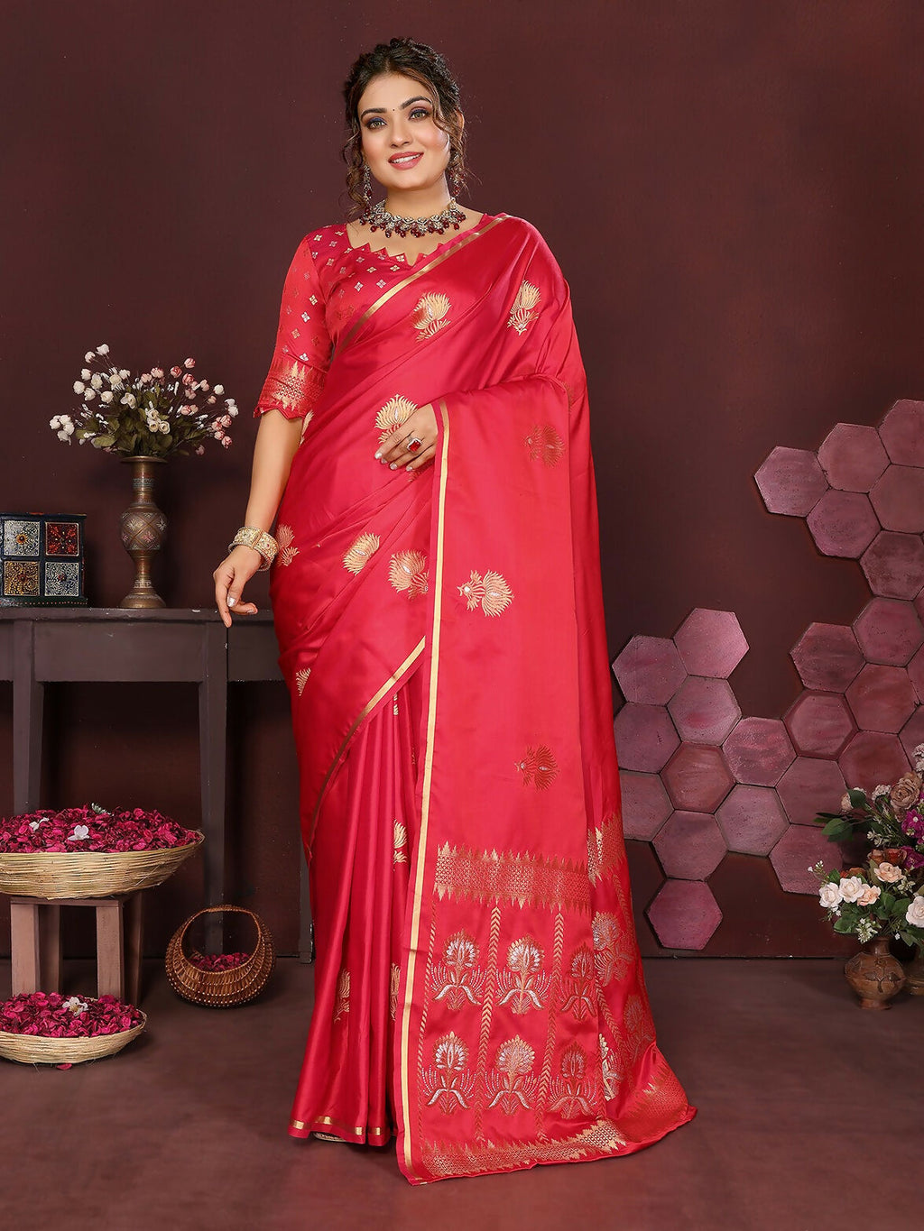 Reddish-Pink Banarasi silk saree with floral motifs and unstitched blouse