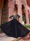Front view of a floor-length black georgette gown with detailed zari and sequins embroidery work.