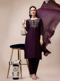 Woman wearing a multicolor hand embroidered Chanderi kurta set with pant and matching dupatta.