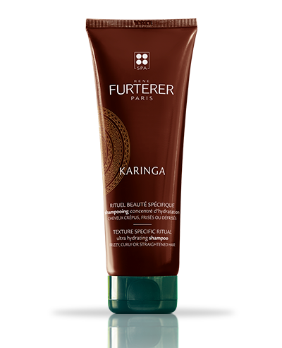 Rene Furterer Karinga Ultra Hydrating Shampoo bottle in brown and green.