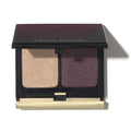 Kevyn Aucoin eyeshadow duo in gold and plum shades in a luxury compact.