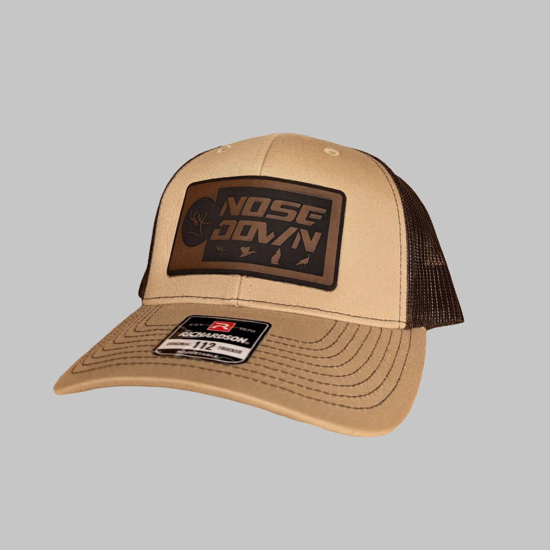 Red Man Trucker Hat with Leather Patch for Outdoors Enthusiasts