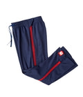 Youth lightweight adaptive pants in blue with red full-length side zippers and pull-on elastic waistband.