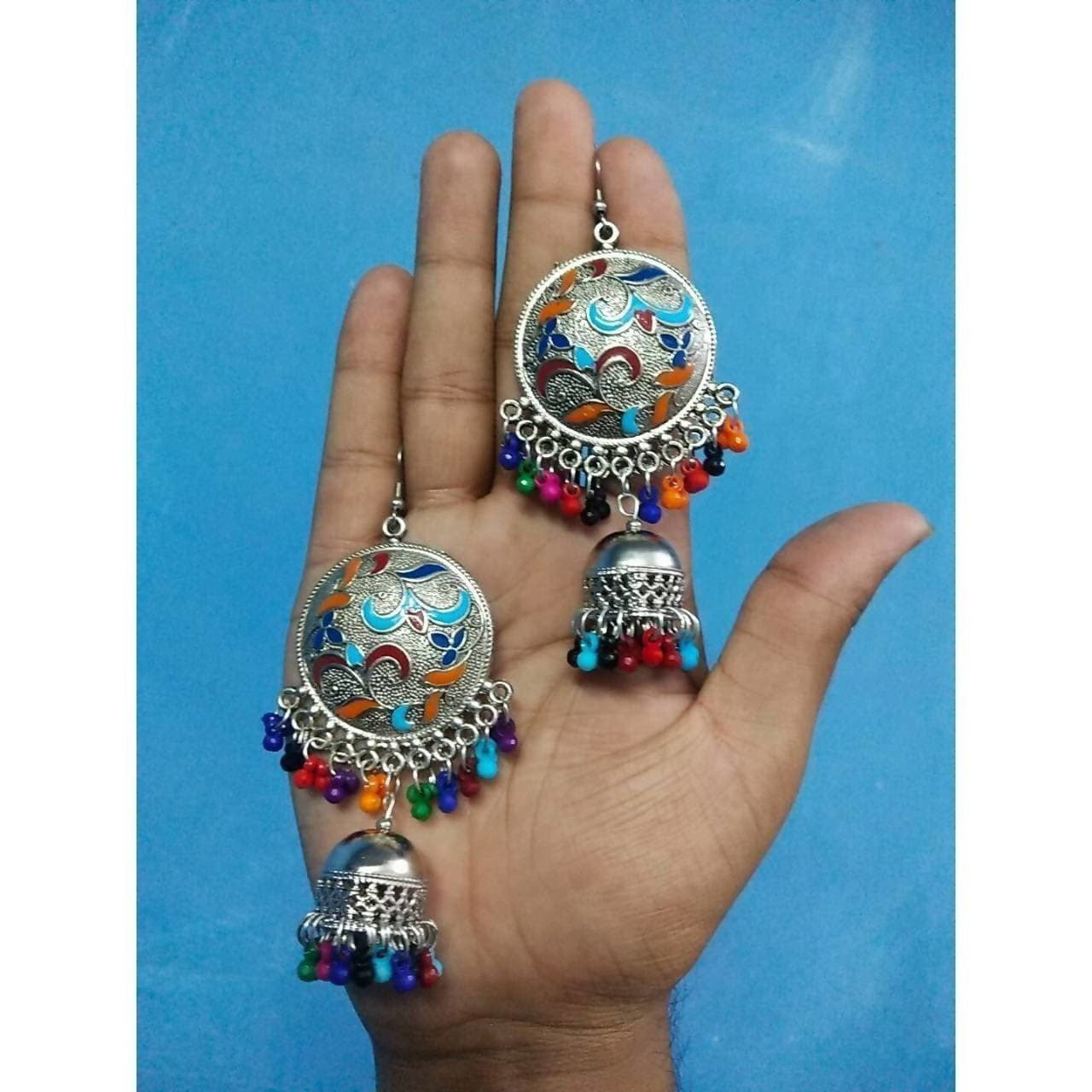 Antique design multicolor hanging jhumka earrings featuring decorative pearls