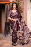 Maroon dolla silk blend saree with batik print and matching blouse