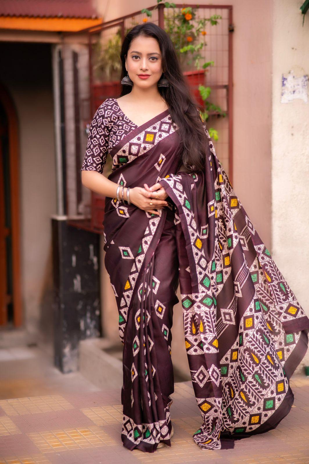 Maroon dolla silk blend saree with batik print and matching blouse