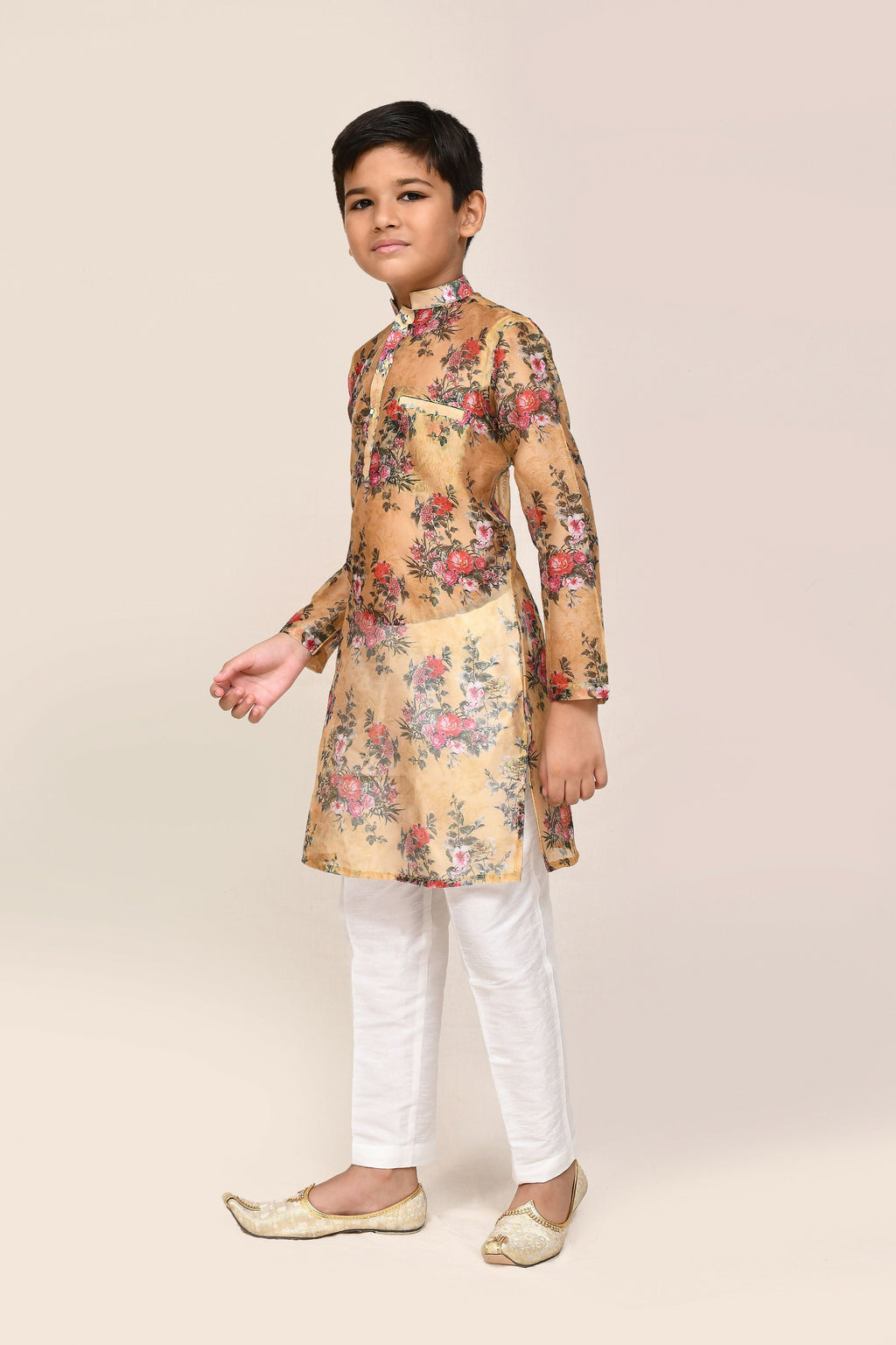 Bright yellow georgette kurta styled with white straight-fit pants