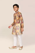 Bright yellow georgette kurta styled with white straight-fit pants