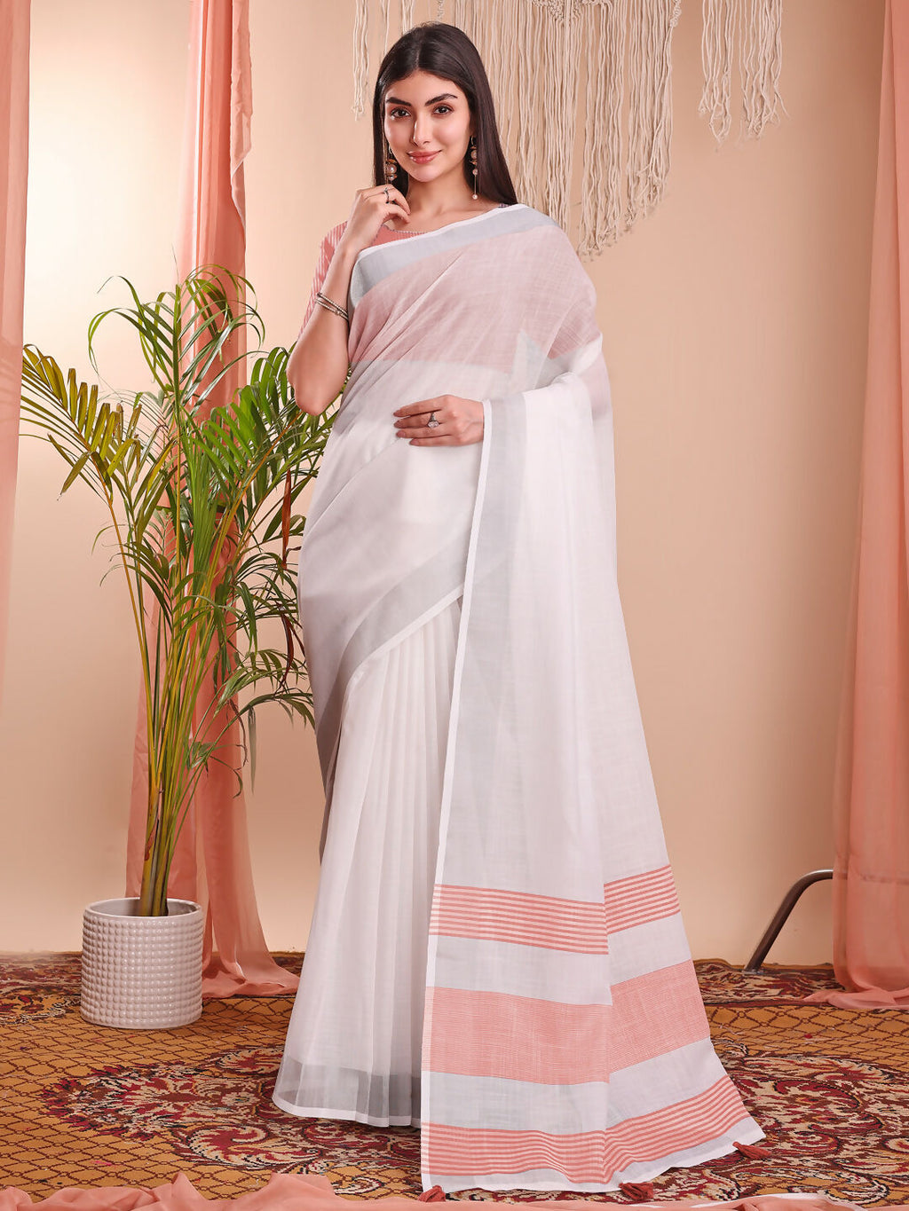 The White Loom white linen cotton saree with matching blouse fabric
