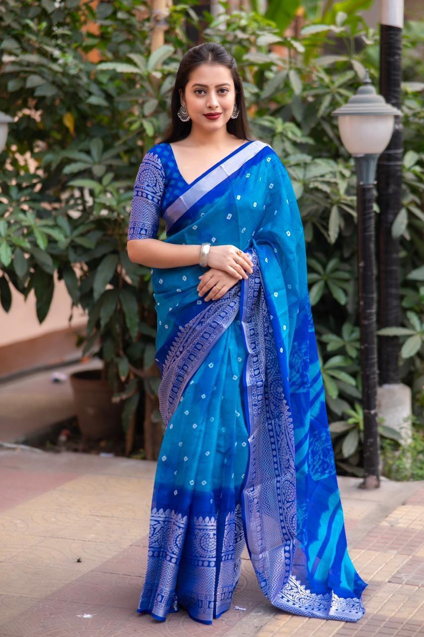 Blue jute silk saree with all-over bandhani print and cut broaso border