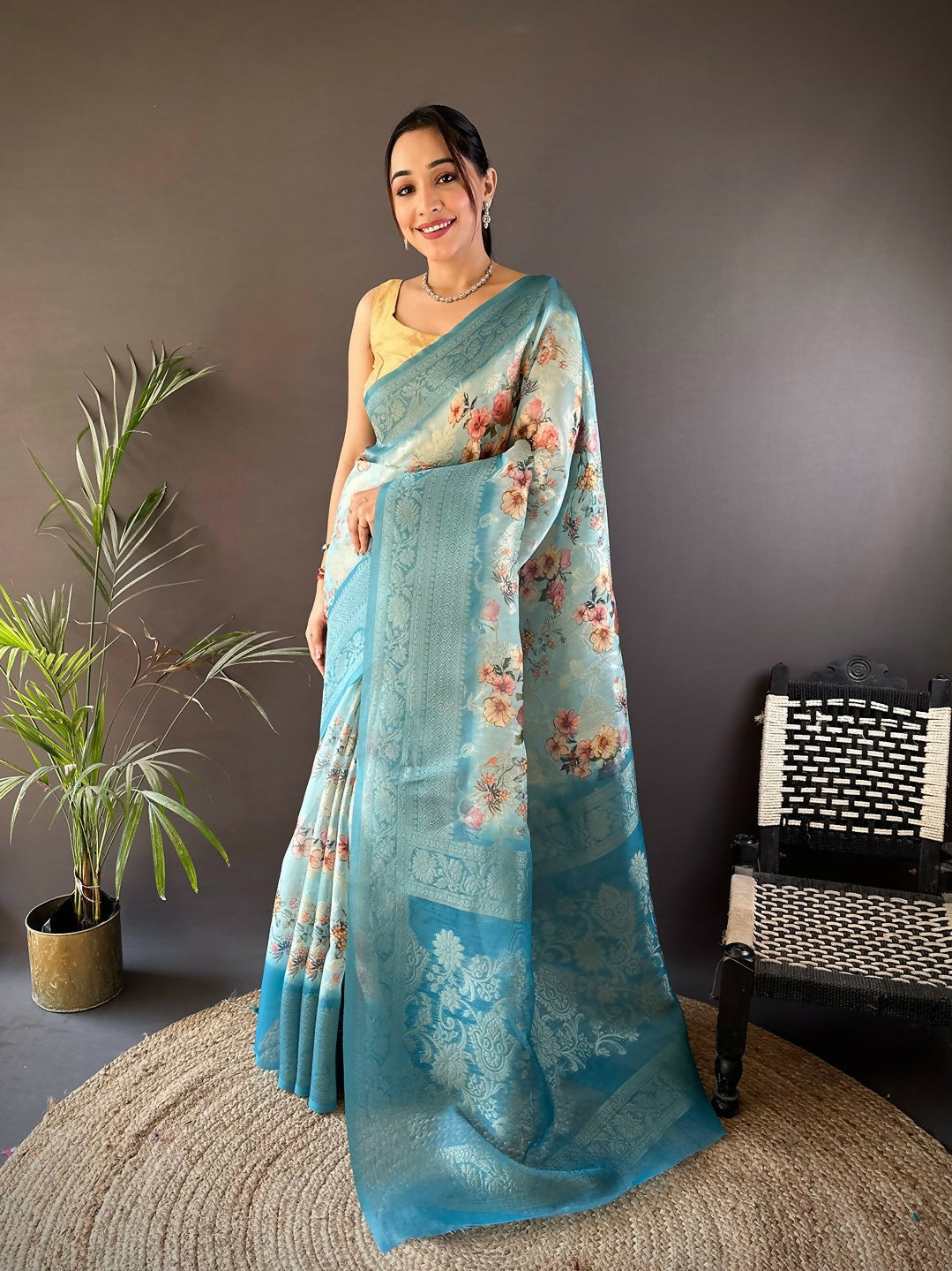 Sky blue soft silk Banarasi saree with intricate floral motifs and unstitched blouse piece