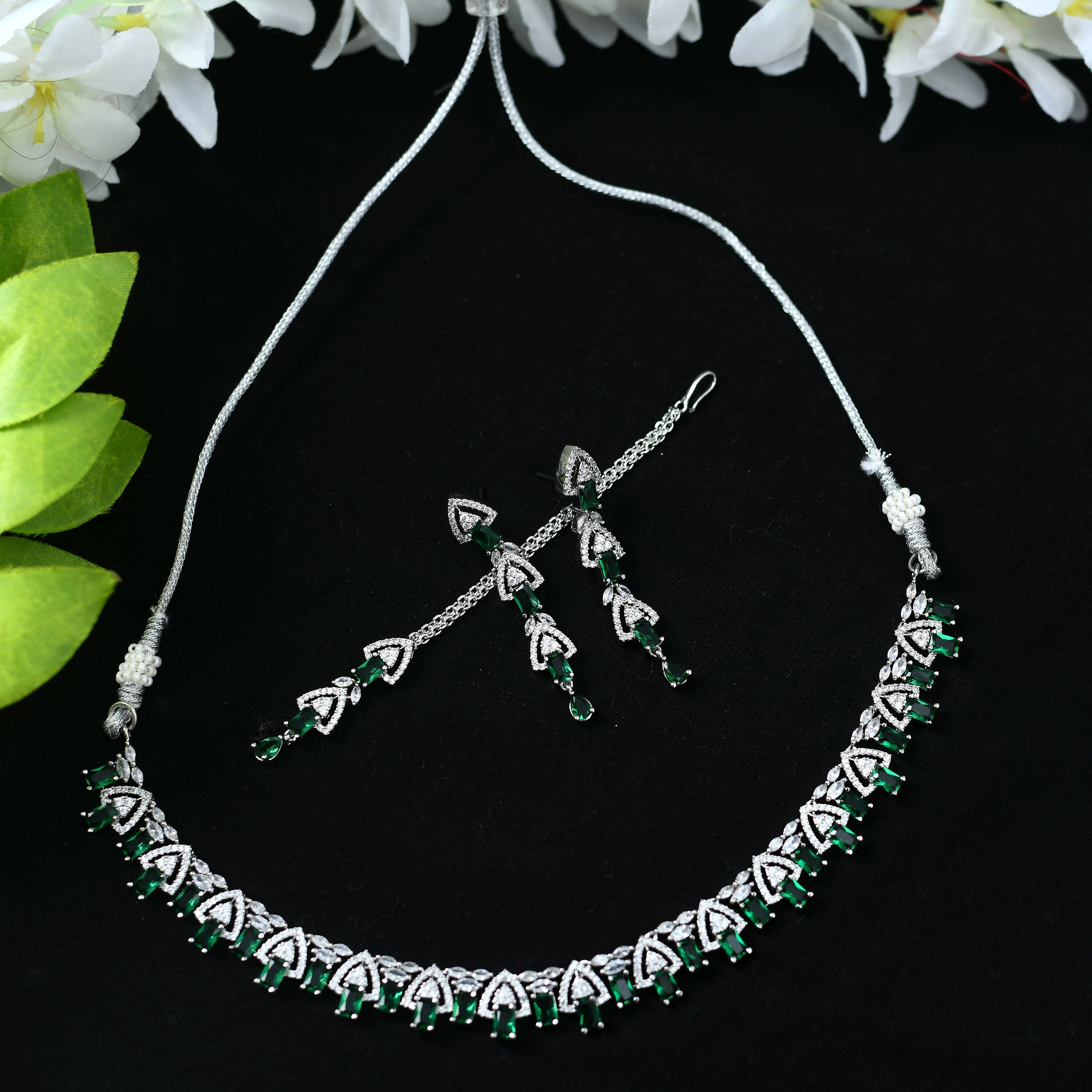 Silver-plated American Diamond choker set featuring vibrant green stones
