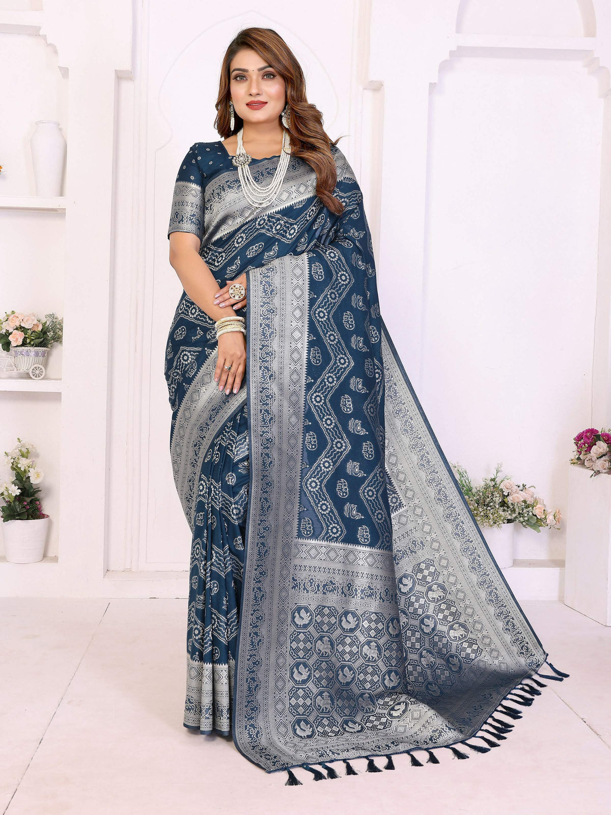 Teal Blue Georgette Silk Saree with Leheriya pattern and gold zari weaving