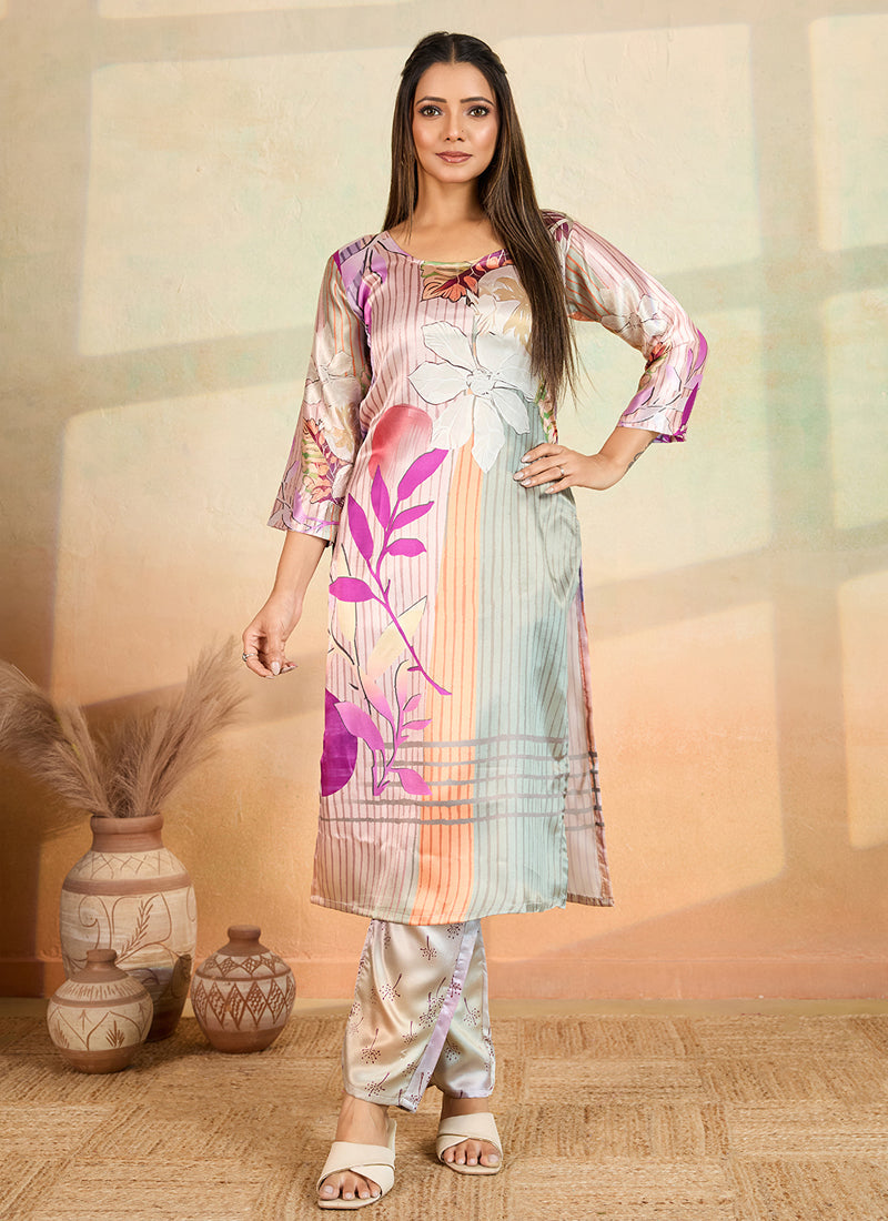 Woman wearing a multi-color printed cotton rayon kurta paired with matching printed pants