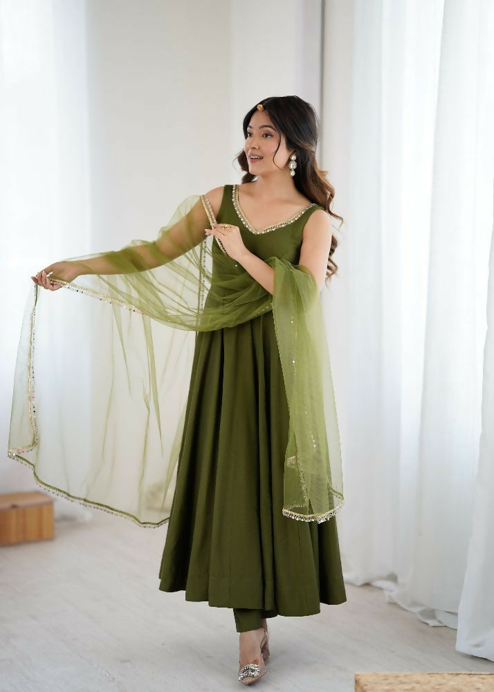 Mehendi colored Chanderi kurta set detailed with sequin embroidery