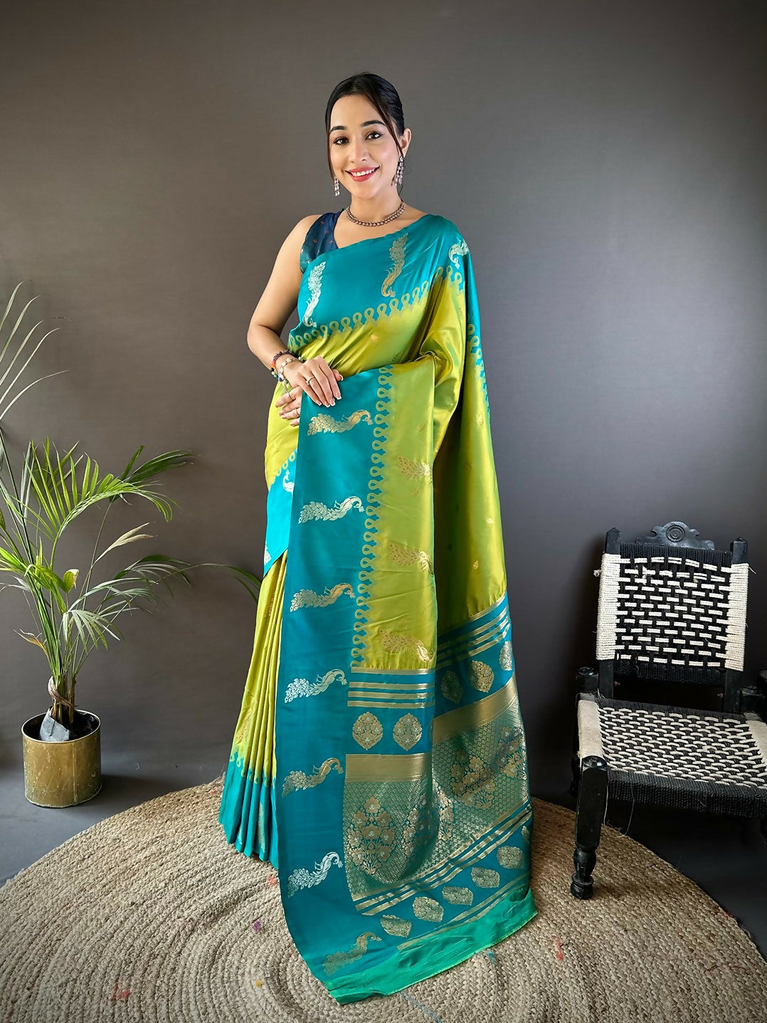 Teal Banarasi silk saree featuring peacock butti pattern and unstitched blouse