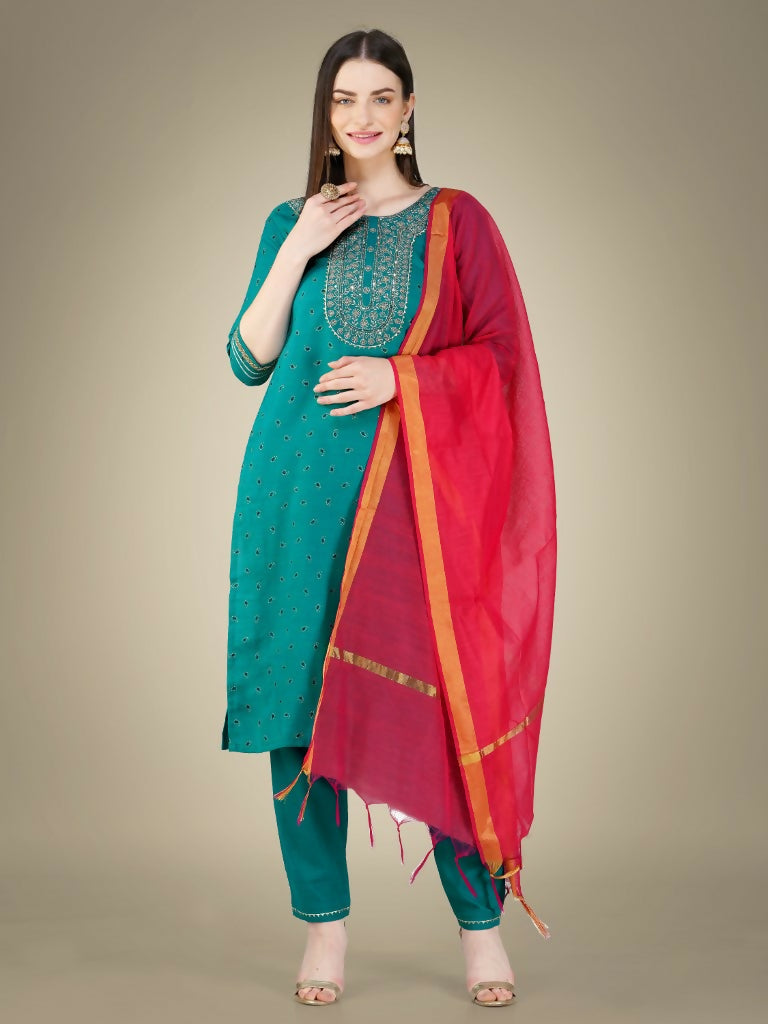 Women's Rama colored Cotton Magic Slub kurta featuring sequence work and embroidery, including matching trousers and dupatta.