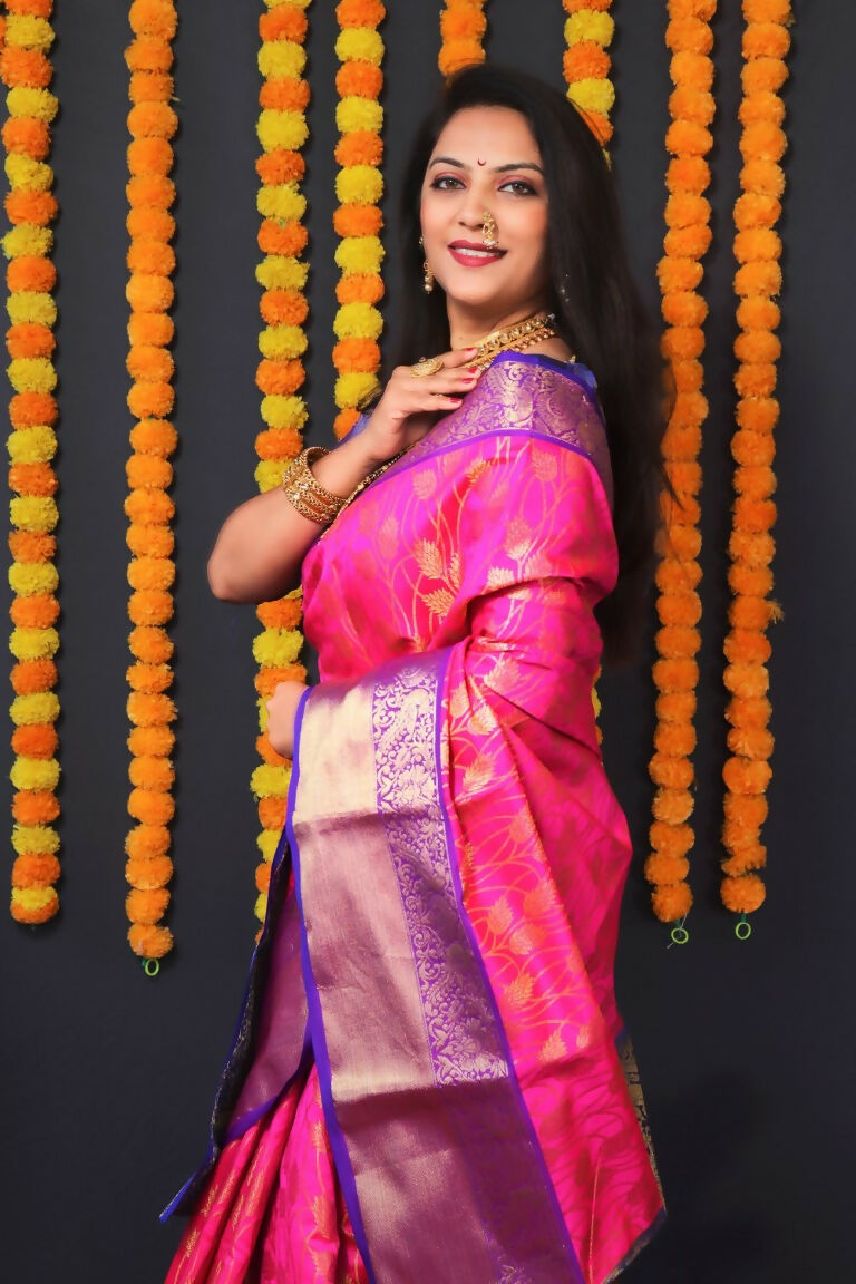 Pink Kanjivaram Silk Saree with Blue Blouse and Zari Woven Border