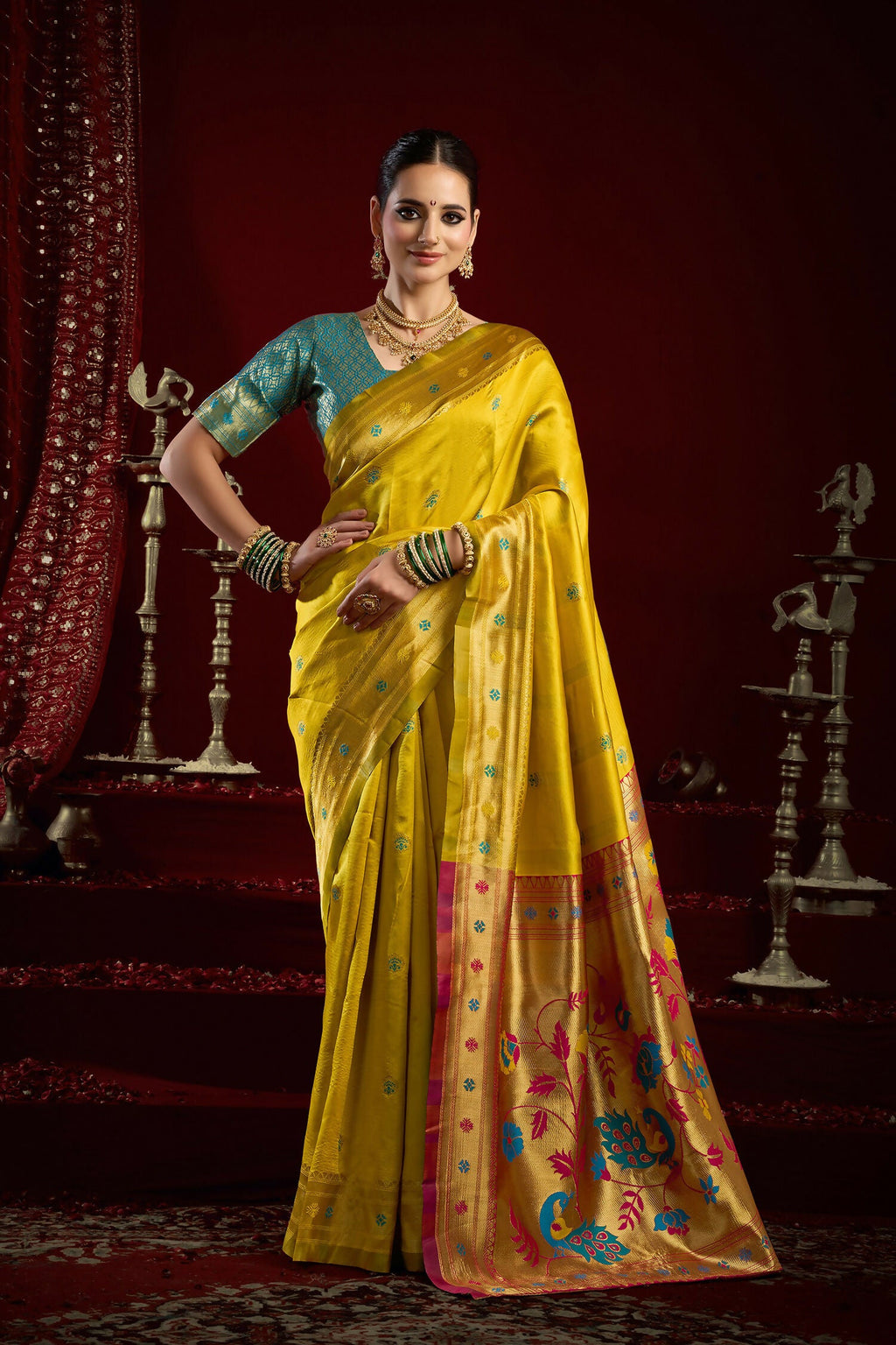 Vibrant yellow silk blend saree with traditional butti work