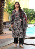Black cotton silk salwar suit featuring floral prints and detailed zari and sequins embroidery.