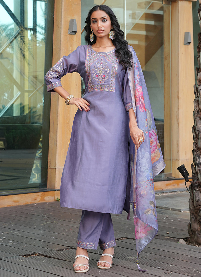 Lavender cotton silk designer salwar suit featuring detailed thread, zari, and sequin embroidery with kodi latkans.