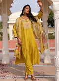 Elegant yellow cotton silk salwar suit with intricate thread and sequins embroidery and matching embroidered pant