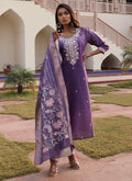 Lavender shimmer silk salwar suit with elegant thread and sequins embroidery and cotton inner lining.