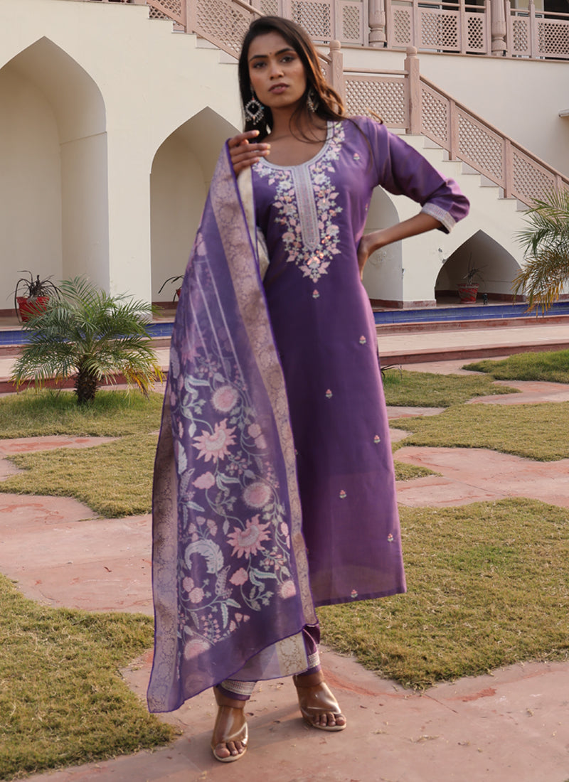 Lavender shimmer silk salwar suit with elegant thread and sequins embroidery and cotton inner lining.