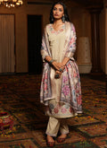 Elegant beige cotton silk designer salwar suit with intricate thread and sequins embroidery and matching embroidered pants.