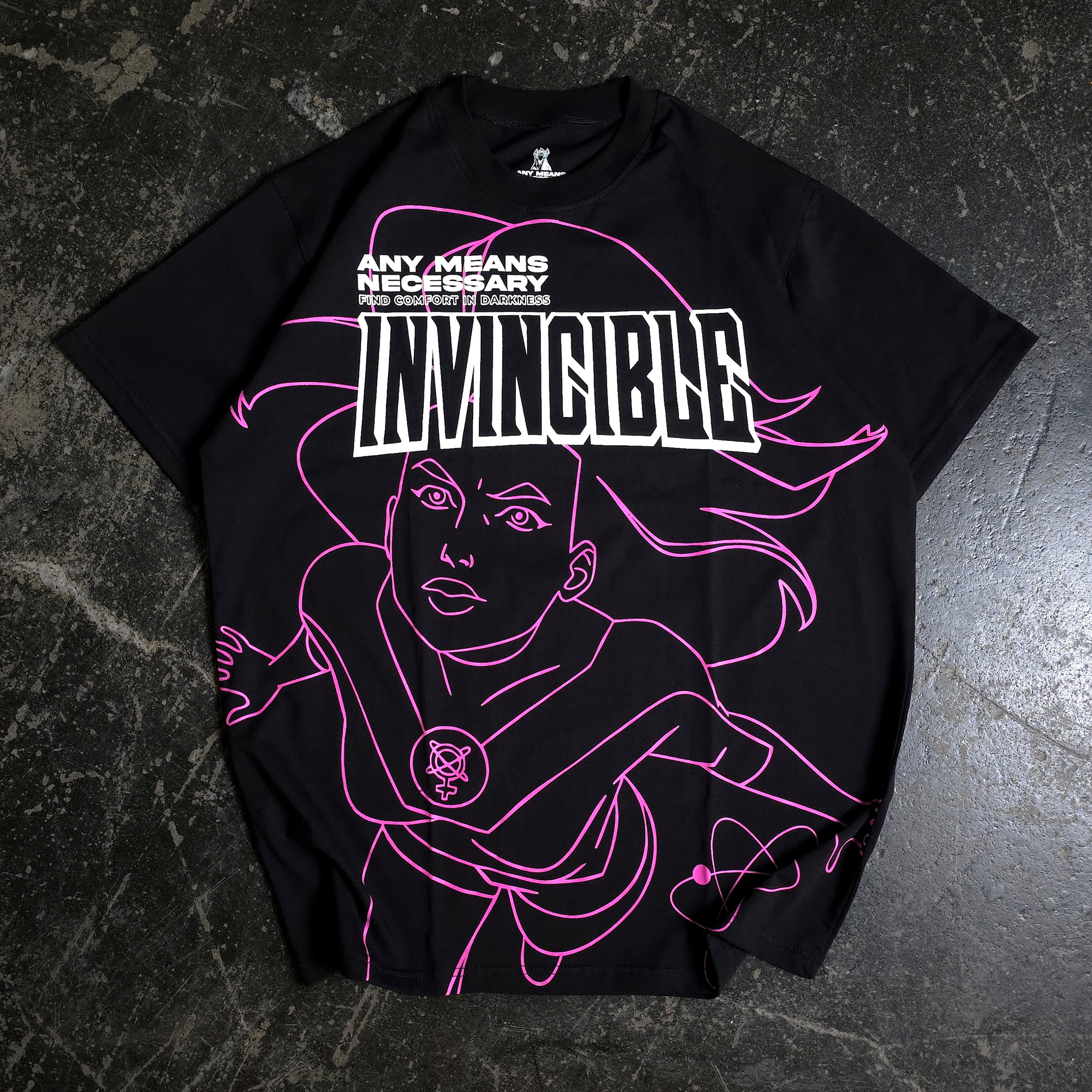 A black t-shirt with a neon pink line-art graphic featuring a character and the word INVINCIBLE.