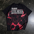 A black t-shirt with a red line art dinosaur graphic and the text Invincible on the front.
