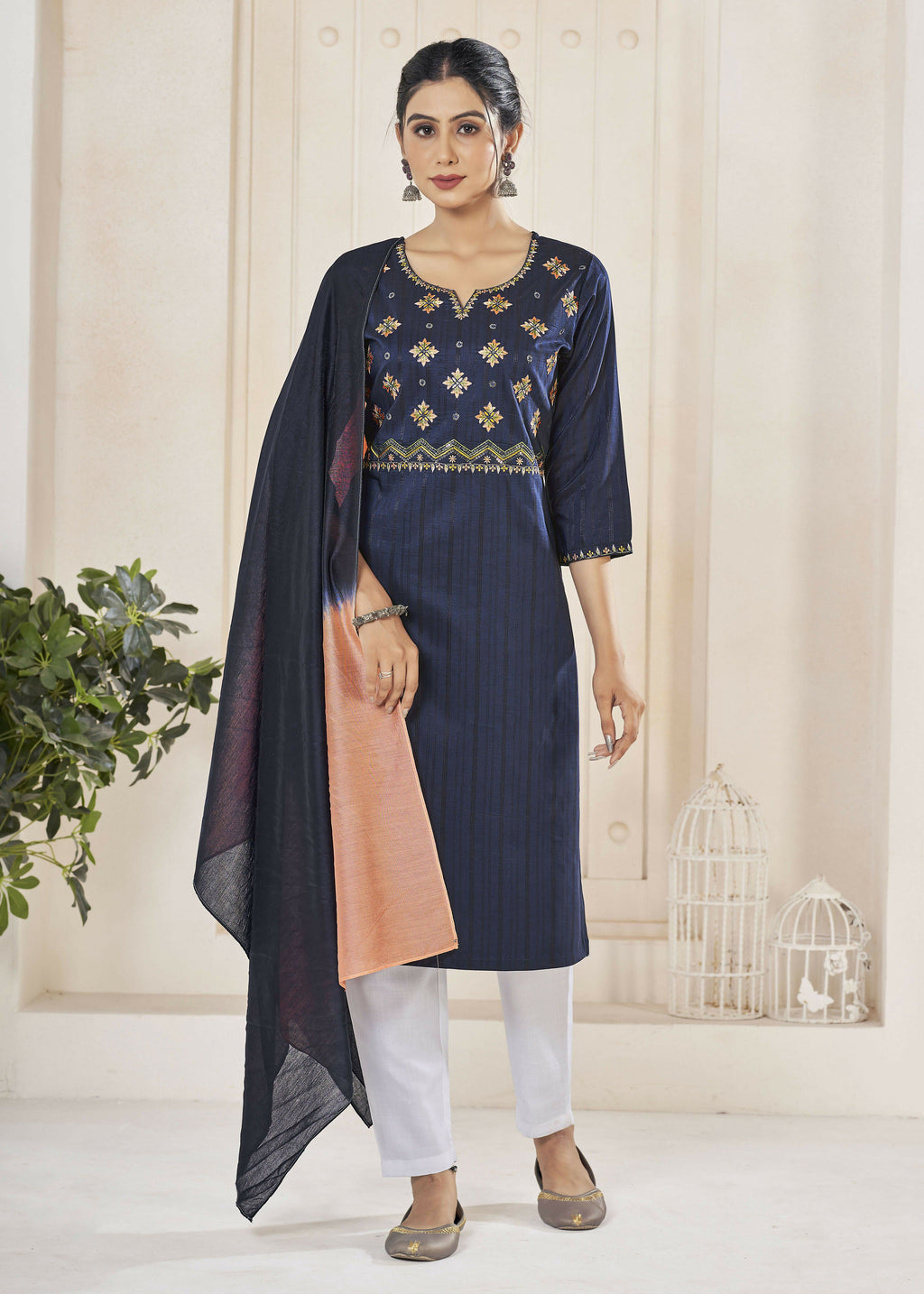 Woman wearing a Navy Blue pure viscose straight kurta with embroidery and weaving stripes.